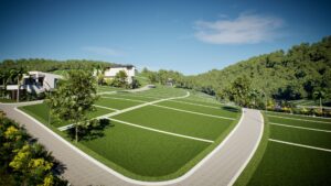Maquete eletrônica 3D da área de lazer e pórtico de entrada do Residencial Colinas, mostrando playgrounds, palmeiras e paisagismo integrado aos lotes nas encostas verdes. Criado por Pixel Blend.